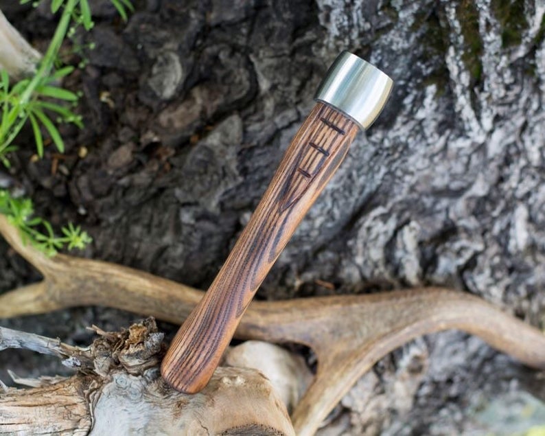 Small fist axe with a case