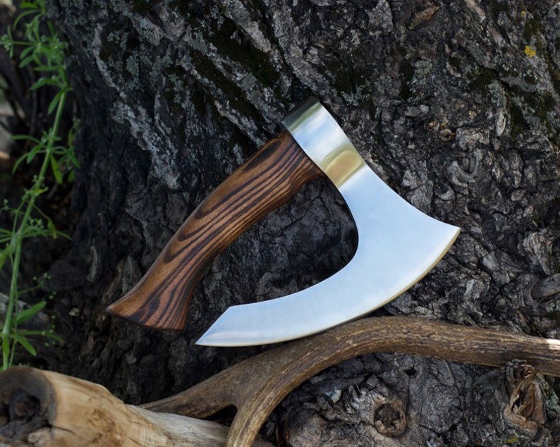 Small fist axe with a case