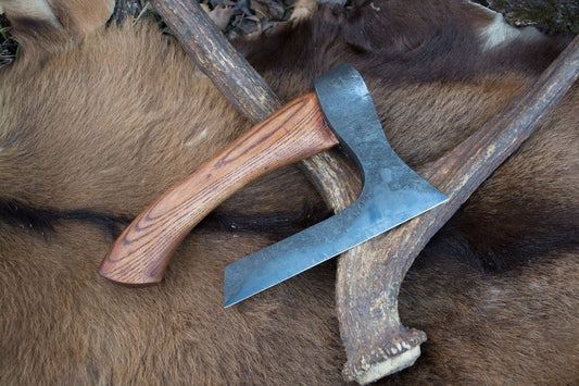 Forged fist axe with a case
