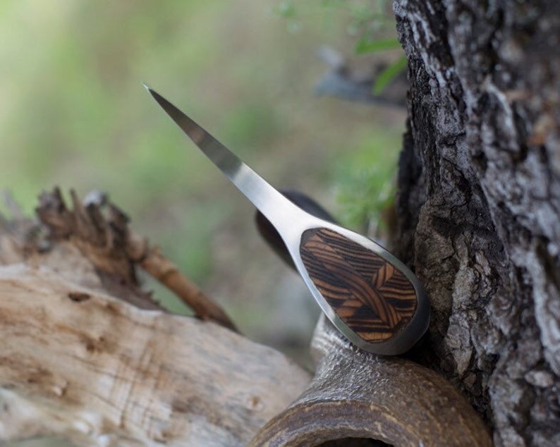 Small fist axe with a case